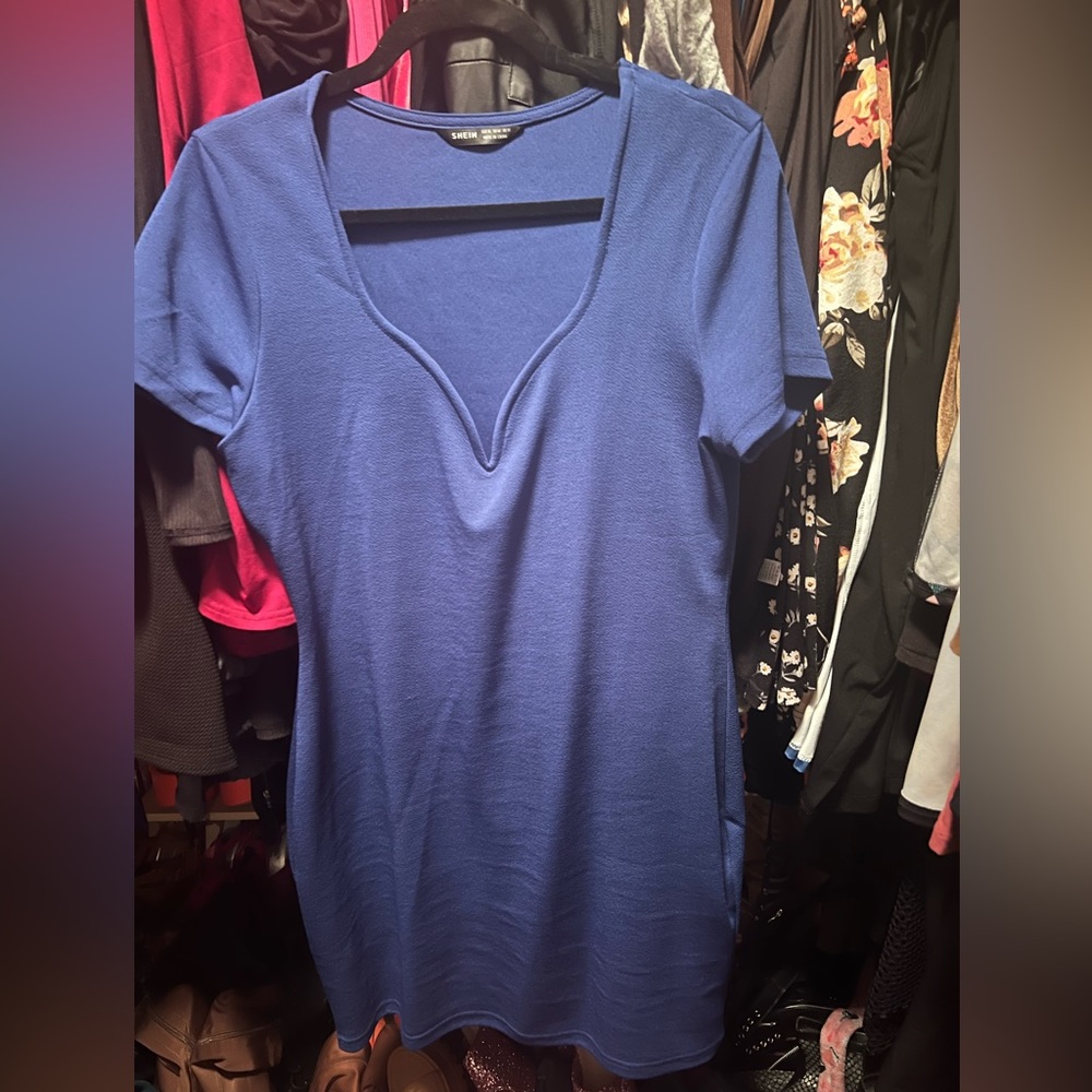 Size large dark blue dress.